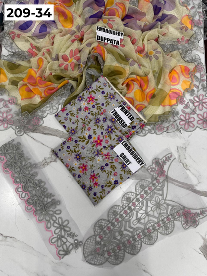 VOL 209 | DS 34 | LAWN 3PC PRINTED LAWN SHIRT ALONG WITH EMBROIDERED PATCHES PRINTED TROUSER EMBROIDERED DUPATTA