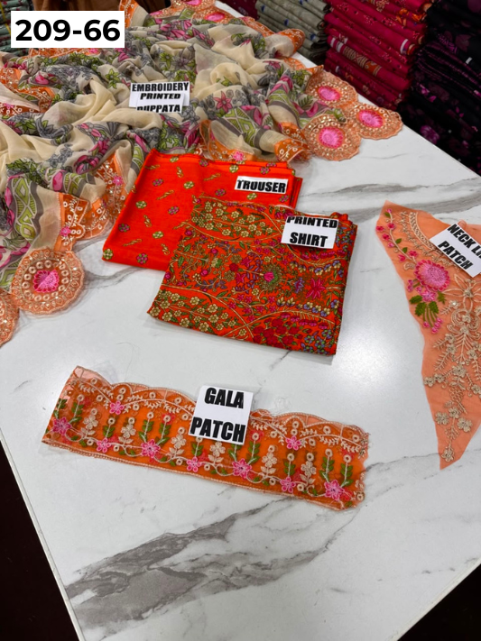 VOL 209 | DS 66 | LAWN 3PC PRINTED LAWN SHIRT ALONG WITH EMBROIDERED PATCHES PRINTED TROUSER EMBROIDERED DUPATTA