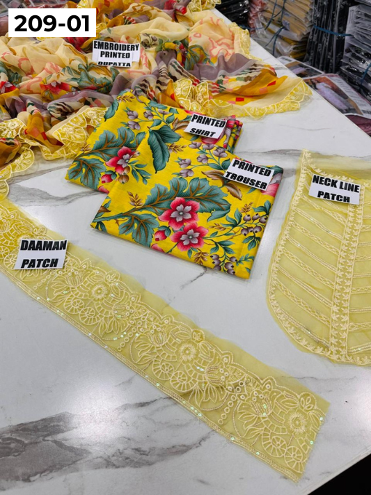 VOL 209 | DS 01 | LAWN 3PC PRINTED LAWN SHIRT ALONG WITH EMBROIDERED PATCHES PRINTED TROUSER EMBROIDERED DUPATTA