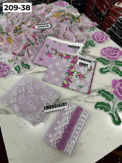 VOL 209 | DS 38 | LAWN 3PC PRINTED LAWN SHIRT ALONG WITH EMBROIDERED PATCHES PRINTED TROUSER EMBROIDERED DUPATTA