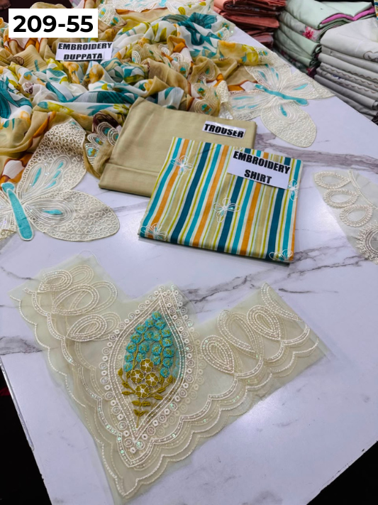VOL 209 | DS 55 | LAWN 3PC PRINTED LAWN SHIRT ALONG WITH EMBROIDERED PATCHES PRINTED TROUSER EMBROIDERED DUPATTA