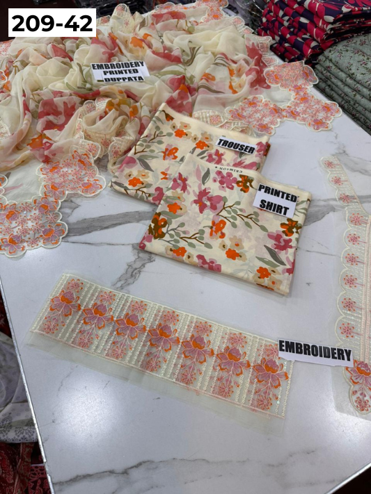 VOL 209 | DS 42 | LAWN 3PC PRINTED LAWN SHIRT ALONG WITH EMBROIDERED PATCHES PRINTED TROUSER EMBROIDERED DUPATTA