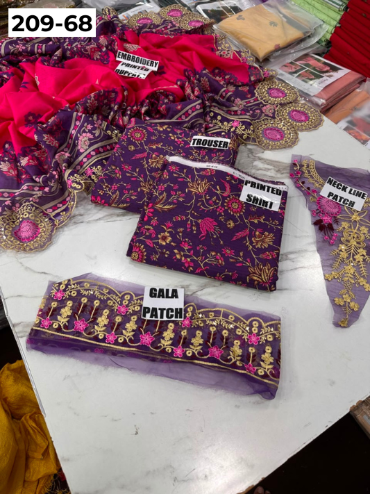VOL 209 | DS 68 | LAWN 3PC PRINTED LAWN SHIRT ALONG WITH EMBROIDERED PATCHES PRINTED TROUSER EMBROIDERED DUPATTA