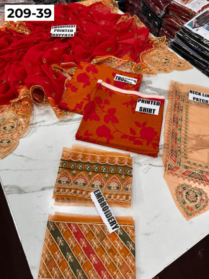 VOL 209 | DS 39 | LAWN 3PC PRINTED LAWN SHIRT ALONG WITH EMBROIDERED PATCHES PRINTED TROUSER EMBROIDERED DUPATTA
