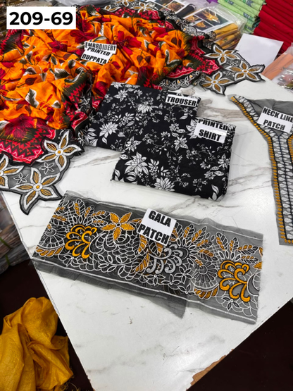 VOL 209 | DS 69 | LAWN 3PC PRINTED LAWN SHIRT ALONG WITH EMBROIDERED PATCHES PRINTED TROUSER EMBROIDERED DUPATTA