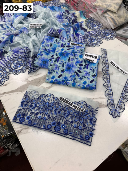 VOL 209 | DS 83 | LAWN 3PC PRINTED LAWN SHIRT ALONG WITH EMBROIDERED PATCHES PRINTED TROUSER EMBROIDERED DUPATTA